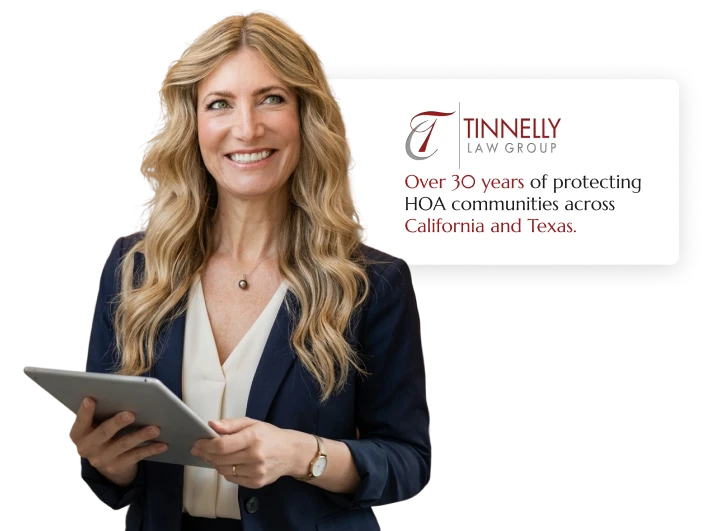 HOA attorney / HOA law A woman with long blonde hair holding a tablet, with a white card behind her with the Tinnelly Law