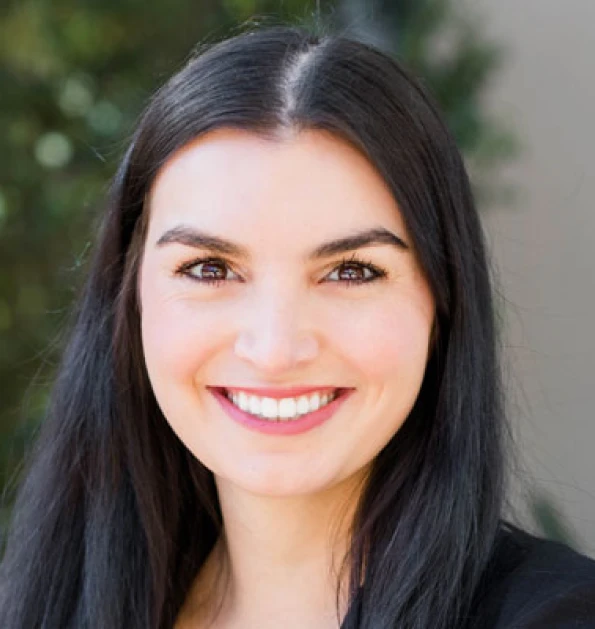 HOA attorney / HOA law A woman with long, dark hair and a warm smile, looking directly at the camera. She is an attorney who specializes in HOA law, and her expertise is …